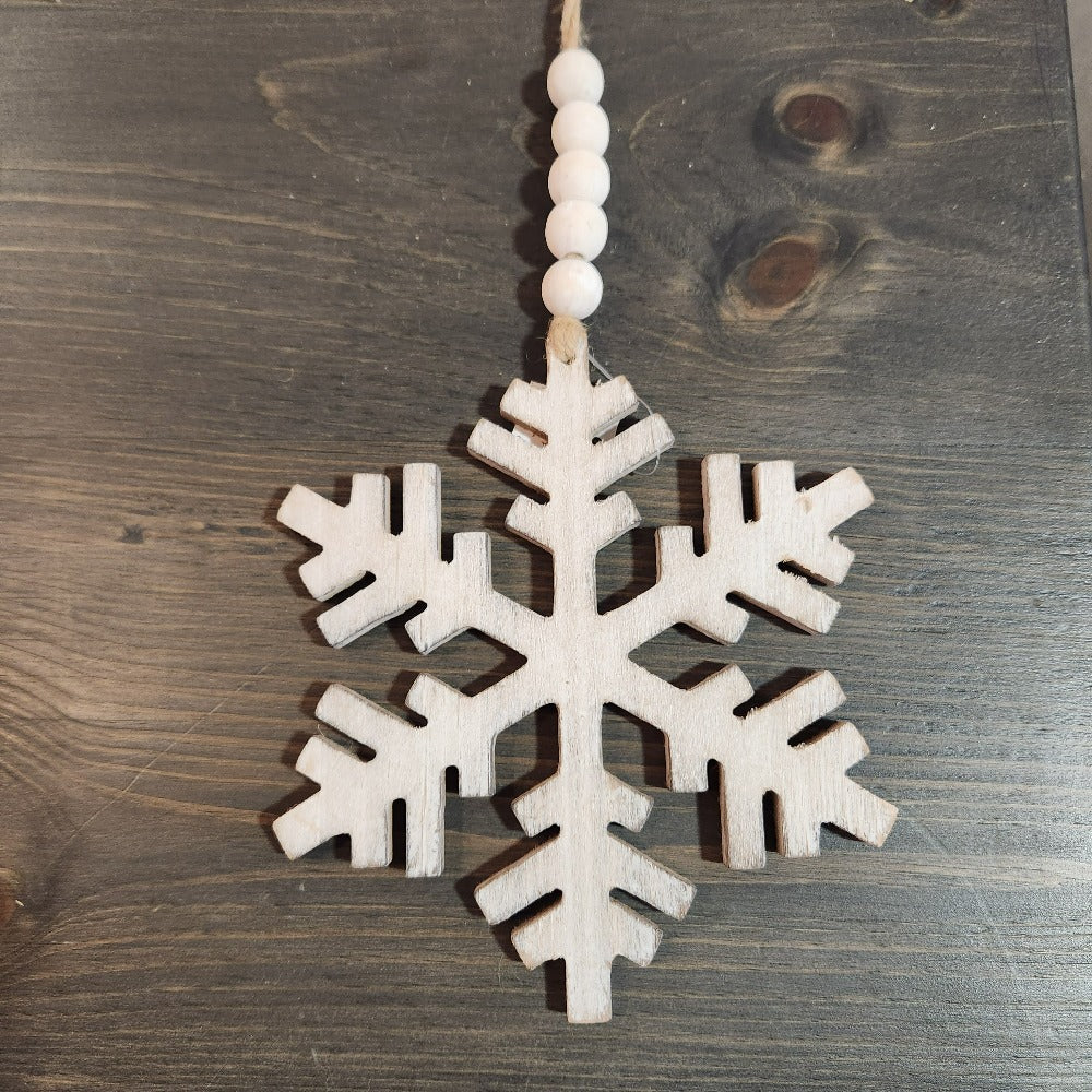 pointed wood beaded snowflake