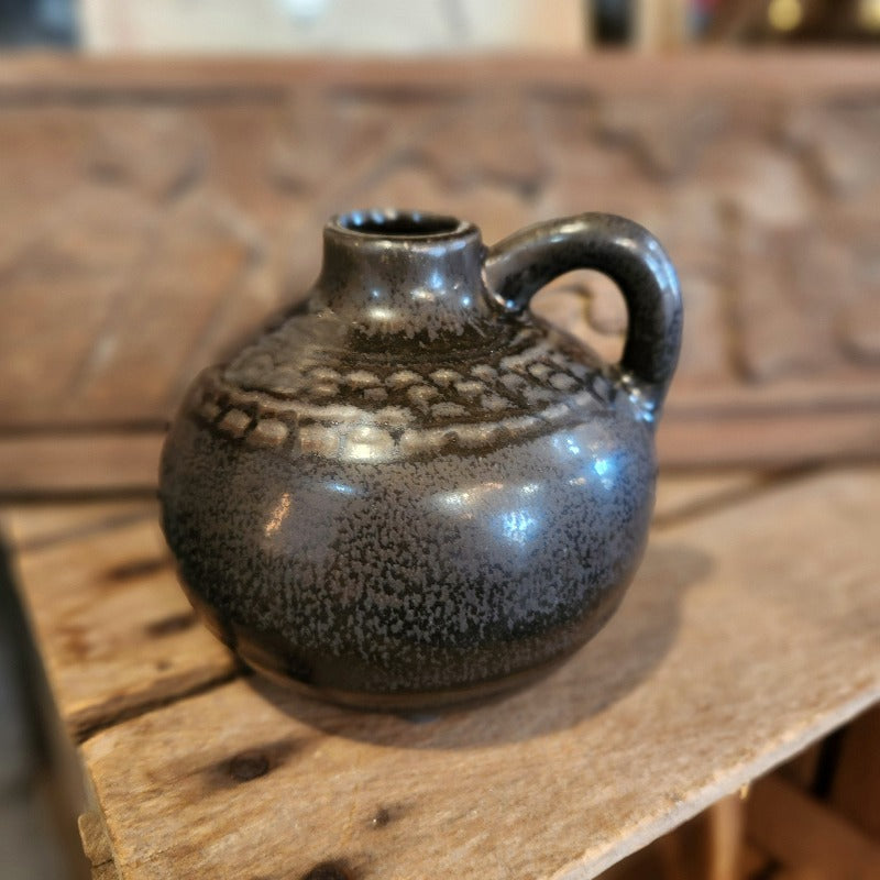 small brown handled jug