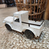 rusty-cream-metal-truck-back