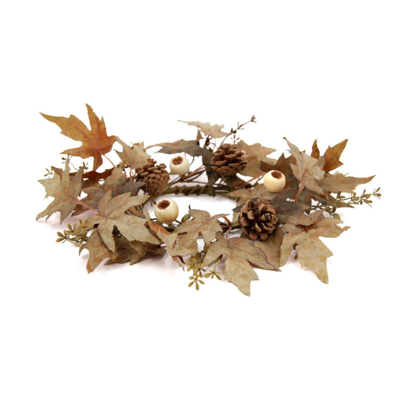 Decorative wreath with leaves and pinecones on a white background