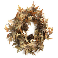 Autumn wreath with leaves, pinecones, and acorns on a white background