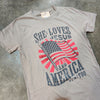 She Loves Jesus & America Tee