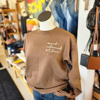 saved. redeemed. set free. brown crewneck sweatshirt